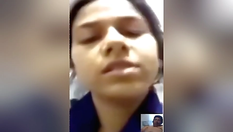 Indian brunette in pink lingerie showing off her tits