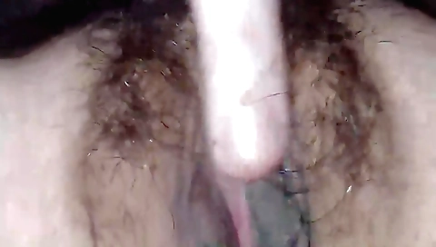 Amateur hairy teen girl is putting her fingers in pussy