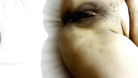 Sexy babe makes her hairy clit bounce as she rubs her pussy