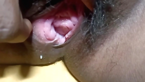 Busty amateur is stretching her hairy ass with a big dildo