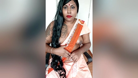 Indian brunette in black dress makes solo porn clip