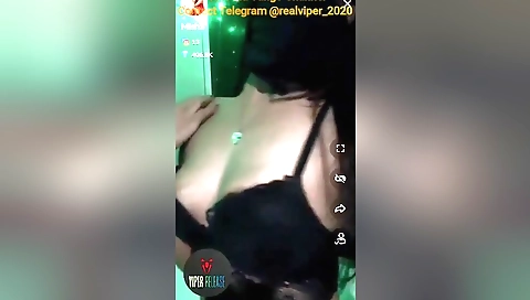 Amazing brunette with a perfect body showing off her body