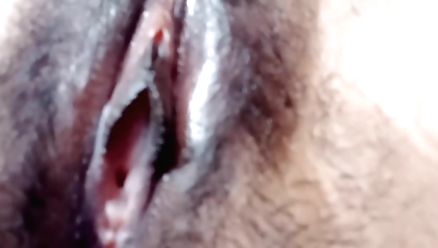 Indian babe in a sexy outfit shows off her hairy pussy