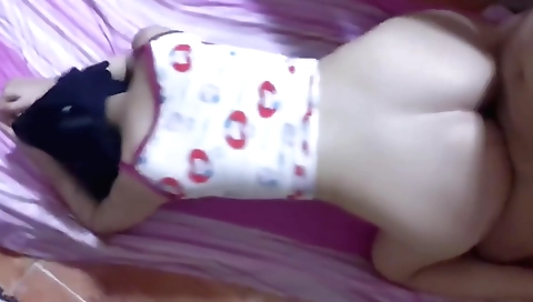 Bright brunette is sucking on a cock and she likes it