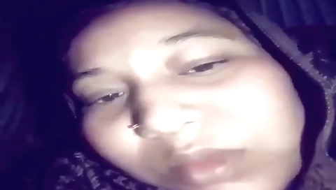 Indian solo beauty in a black bikini in the countryside