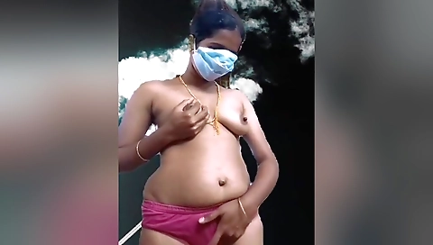 Swetha tamil has her body filmed on the grass outside