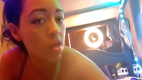 Latina with pink pussy playing with her body in solo scene