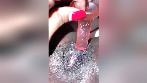 Busty wife with a hairy pussy masturbates with a dildo