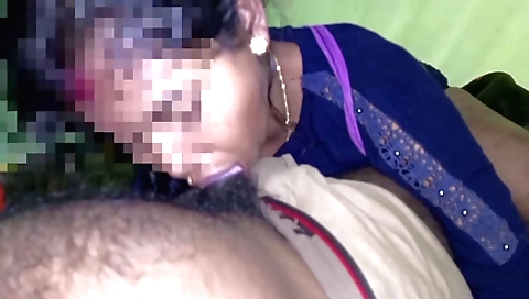 Indian teen gives a deepthroated blowjob on a couch
