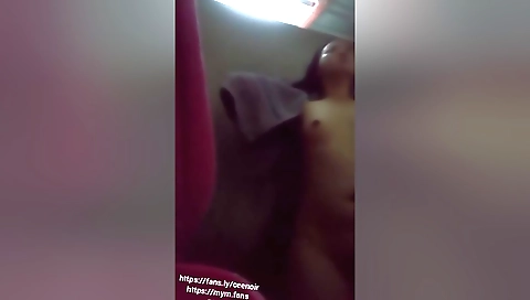 Brunette indian girl in a shower is rubbing her pussy