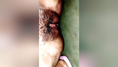 Sexy amateur girl with hairy pussy locked in bed and fingered