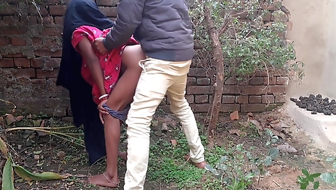 Outdoor amateur is showing a couple of skills in her mouth