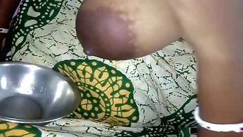 Indian woman with big natural tits is sucking a large cock