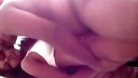 Sexy brunette video with a beautiful face in a sexy pose