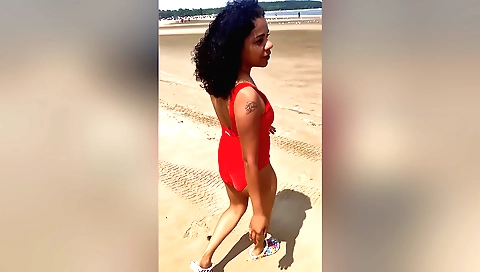 Indian beauty with a sexy body shows a nice scene on the beach