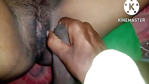 Indian hairy girl with a nice face is having sex in the bedroom