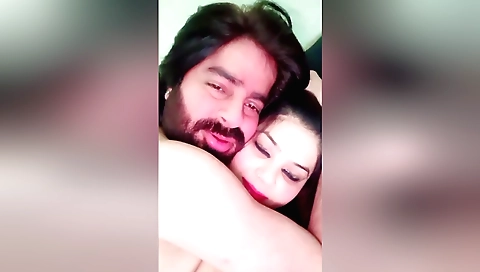 Brunette in black dress with a big black cock in a web cam