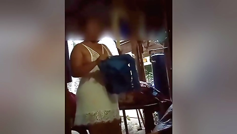 Amateur wife shows her big breasts in outdoor scene