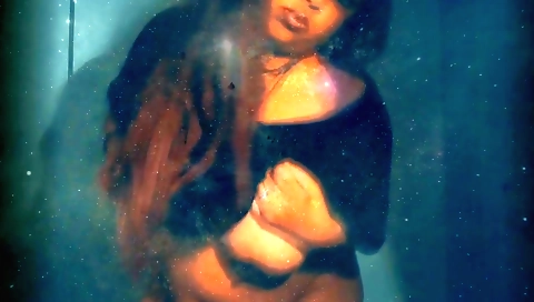 Red bikini girl rides a pole and dances on a chair