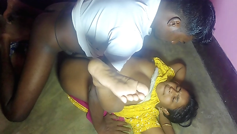 Indian teen in a kitchen gives a handjob to a big cock