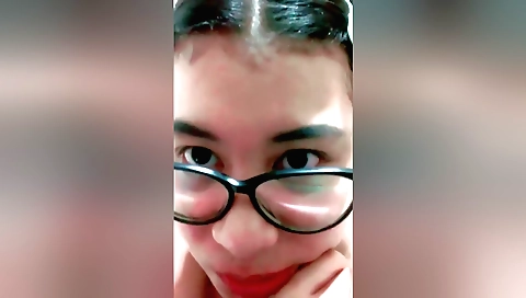 Indian brunette is masturbating in the living room