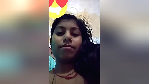 Hot brunette wearing a sexy black dress and showing her pussy