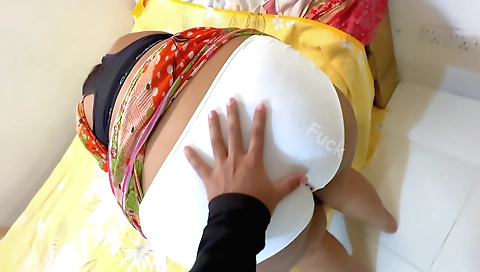 Indian stepson in black leather sash wears saree & panty