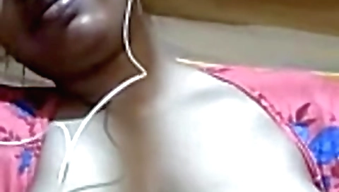 Big boobed brunette is showing off her natural tits