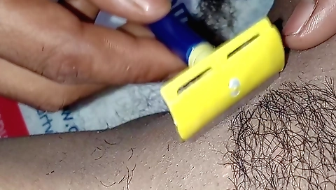 Indian girl with hairy bush gets her pussy cleaned