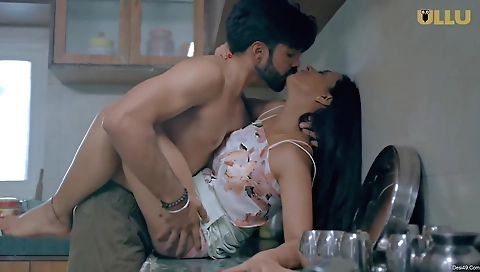 Brunette babe in the kitchen making homemade coffee