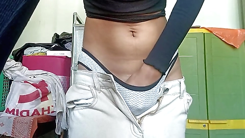 Hot brunette masturbating in her bed in the bedroom