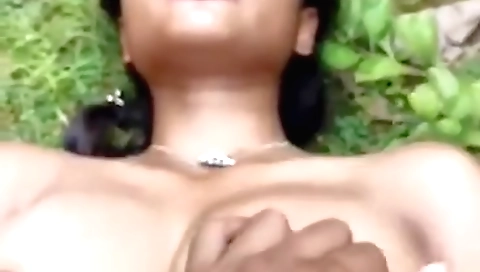 Indian brunette with big boobs fucks in the forest