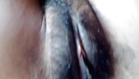 Indian babe is naked and she is making out on her back